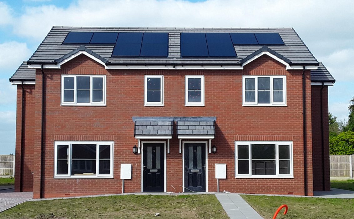 Semi-detached housing with solar panels at Prees in Telford