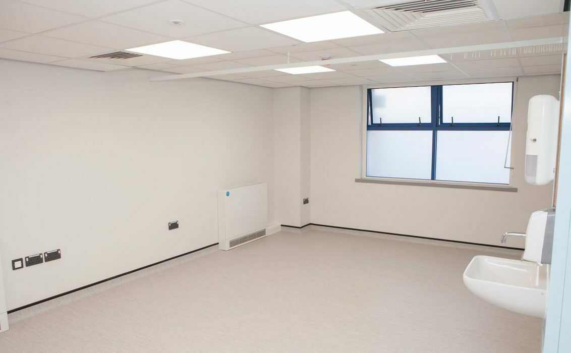 Photograph of a clinic room with sink and window at Hollinswood House in Telford,